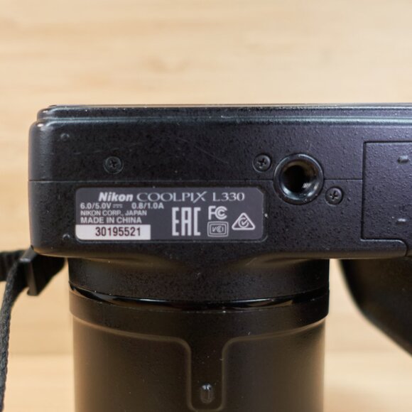 The Nikon Coolpix L330 is a vintage-style 20.2MP digital camera featuring a powe - Picture 7 of 7